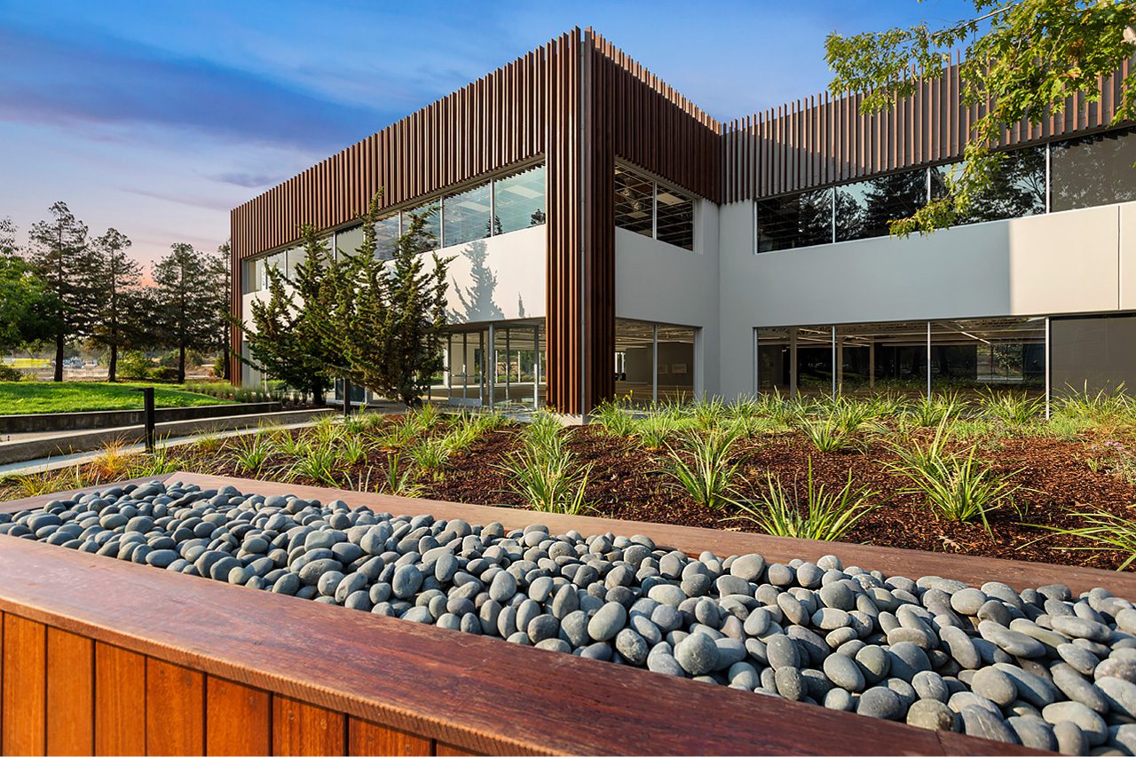 Modern office exterior with landscaped planter